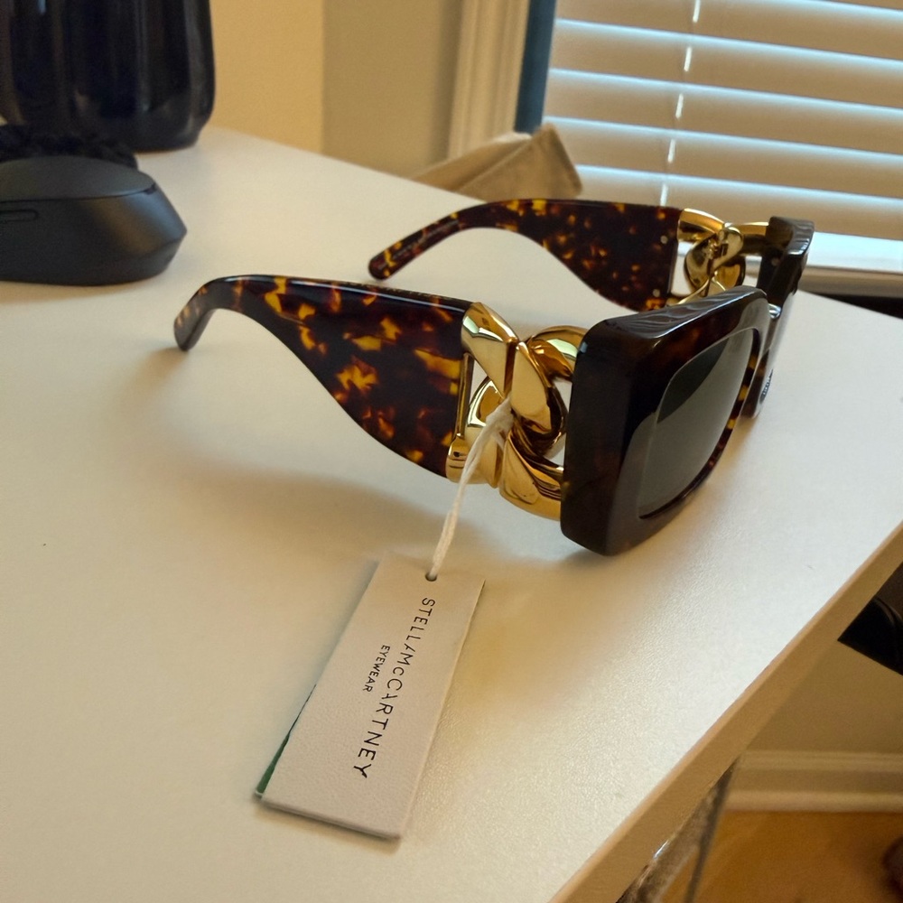 Stella McCartney Tortoise Shell Sunglasses with Gold Chain Detail